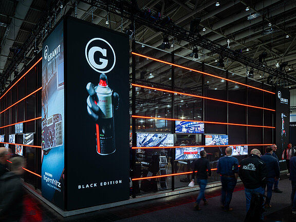 Messestand von Wilhelm Fricke SE - Granit Quality Parts, umgesetzt von Holtmann+, in einer Messehalle in Hannover 2023 auf der Messe Agritechnica.